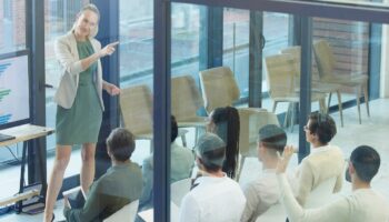 Shot of a young businesswoman giving a presentation at work