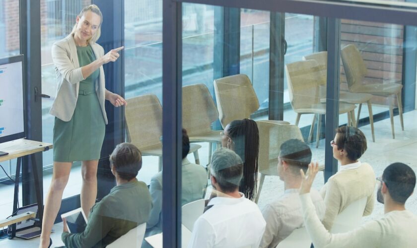 Shot of a young businesswoman giving a presentation at work