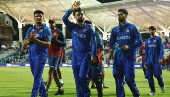 Cricket - T20 World Cup - Semi Final - South Africa v Afghanistan - Brian Lara Stadium, Tarouba, Trinidad and Tobago - June 26, 2024 Afghanistan's Rashid Khan and teammates react after the match REUTERS/Ash Allen