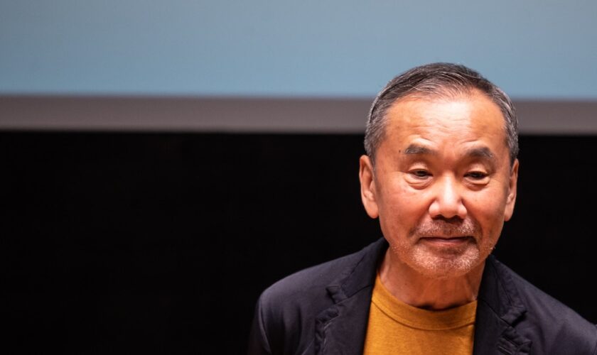 Japanese writer Haruki Murakami attends a press conference during a media preview of The Waseda International House of Literature, also known as Haruki Murakami Library, which is designed by Japanese architect Kengo Kuma, at Waseda University in Tokyo on September 22, 2021. (Photo by Philip FONG / AFP)