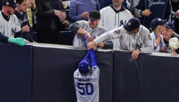 Yankees fans who interfered with Mookie Betts in World Series banned from MLB stadiums indefinitely: report