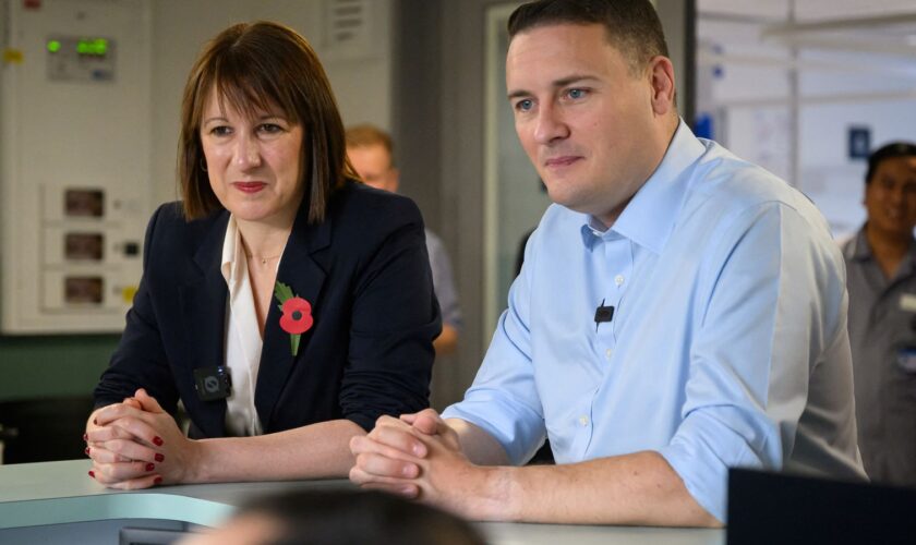 Chancellor of the Exchequer Rachel Reeves and Health Secretary Wes Streeting speak with members of the staff as they visit St. George's Hospital, on October 28, 2024 in London, Britain. Leon Neal/Pool via REUTERS