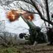 Servicemen of artillery crew of the special unit National Police fire a D-30 howitzer towards Russian troops at a position in a front line, amid Russia's attack on Ukraine, in Zaporizhzhia region, Ukraine January 11, 2025. REUTERS/Stringer