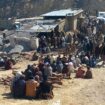 Local residents gather as rescuers conduct an operation to recover coal mine workers following a methane gas explosion caused a coal mine to collapse in Singidi, a remote area of southwest Pakistan's Balochistan province, Friday, Jan. 10, 2025. (AP Photo)