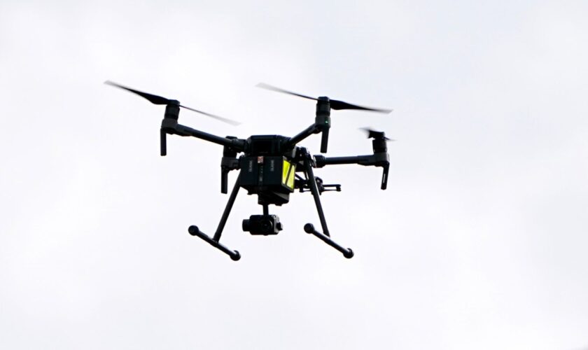 Police Scotland officers use a drone to investigate a remote area of ground at Auchenbreck near Dunoon, Argyll, to find the remains of businesswoman Lynda Spence who was last seen in Glasgow in April 2011. Colin Coats and Philip Wade were both jailed for life in 2013 for the "barbaric" murder of the missing financial adviser. Picture date: Wednesday March 16, 2022.