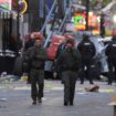 Emergency services attend the scene after a vehicle drove into a crowd on New Orleans' Canal and Bourbon Street, Wednesday Jan. 1, 2025. (AP Photo/Gerald Herbert)