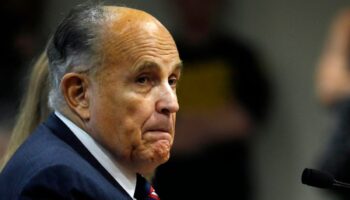 Rudy Giuliani settles with defamed election workers after blowing off property seizure trial