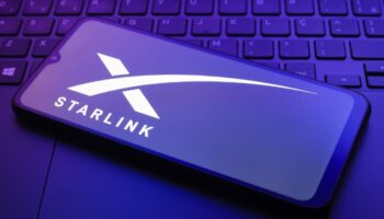 The Starlink logo appears on a smartphone screen in this illustration photo in Reno, United States, on December 20, 2024. (Photo by Jaque Silva/NurPhoto) (Photo by Jaque Silva / NurPhoto / NurPhoto via AFP)