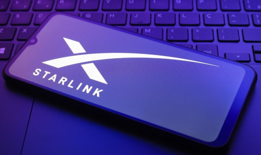 The Starlink logo appears on a smartphone screen in this illustration photo in Reno, United States, on December 20, 2024. (Photo by Jaque Silva/NurPhoto) (Photo by Jaque Silva / NurPhoto / NurPhoto via AFP)