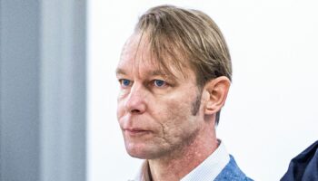 A man, who is a suspect in the disappearance of British toddler Madeleine McCann in Portugal, stands next to his lawyer Friedrich Fuelscher at his trial on unrelated sexual assault charges in Braunschweig, Germany, October 2, 2024. Christian B., is charged with three counts of aggravated rape and two counts of sexual abuse of children in Portugal between June 2007 and December 2000. Moritz Frankenberg/Pool via REUTERS