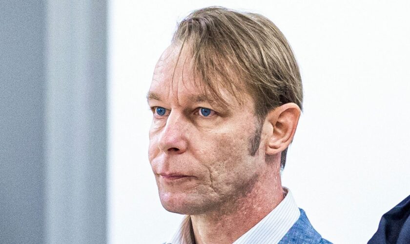 A man, who is a suspect in the disappearance of British toddler Madeleine McCann in Portugal, stands next to his lawyer Friedrich Fuelscher at his trial on unrelated sexual assault charges in Braunschweig, Germany, October 2, 2024. Christian B., is charged with three counts of aggravated rape and two counts of sexual abuse of children in Portugal between June 2007 and December 2000. Moritz Frankenberg/Pool via REUTERS