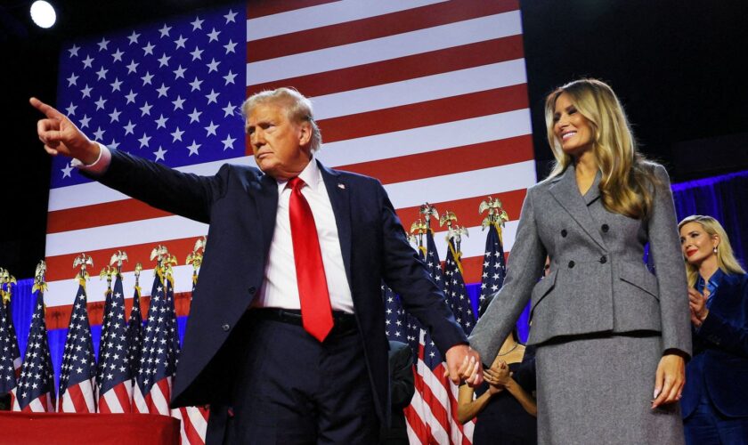 Donald Trump and his wife Melania at an election rally in Florida. Pic: Reuters