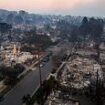 Astonishing video shows LA's scorched earth: Mile after mile of smouldering ruins of what used to be multi million dollar mansions as fires still rage out of control