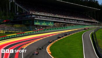 Charles Leclerc leads the field up Eau Rouge at the Spa-Francorchamps circuit