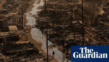 California fires: 11 killed and 10,000 structures destroyed as blazes continue