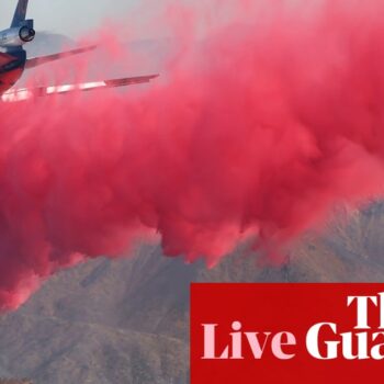 California fires live: progress made against some LA blazes but thickening smoke prompts ‘health emergency’