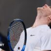 Jack Draper looks to the sky and roars after beating Aleksandar Vukic at the Australian Open