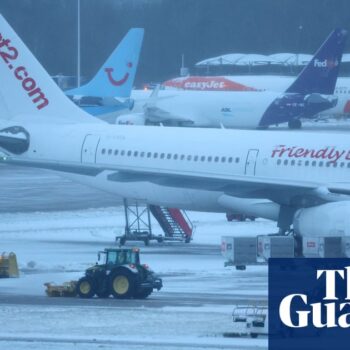 Heavy snow disrupts travel in England and Wales as airports close runways