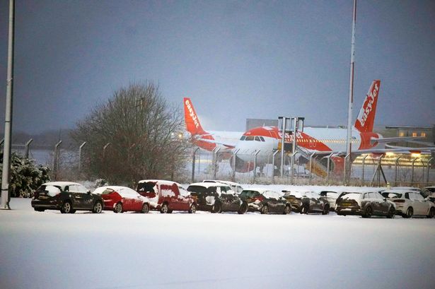 Heavy snow sparks travel chaos as airports closed amid Britain's -11C chill