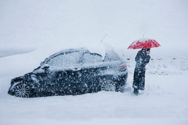 Impending UK snow sees communities cut off and motorists given dire weather warning