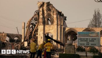 LA crews race to halt wildfires ahead of high winds