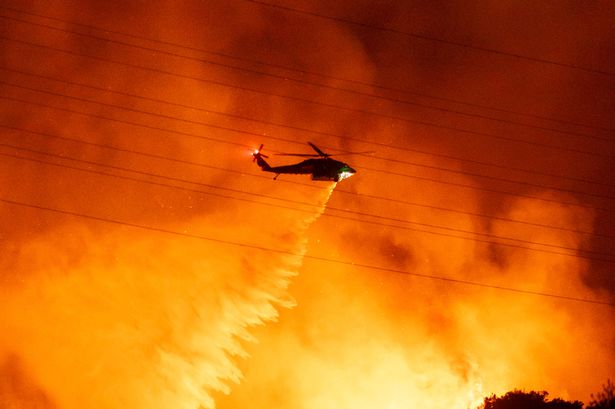 LA fire fury as drones force hero water-dropping planes to evacuate and stop wildfire help