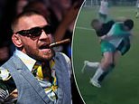 Moment Conor McGregor WRESTLES opponent to the floor in an amateur football game - before following up with a crunching tackle!