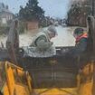 Moment heroic grandson rescues grandparents from their flooded home by carrying them in the bucket of his digger