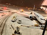 Multiple airports close runways as snow batters Britain amid dire warnings up to 16 inches could fall today in Arctic blast that caused travel chaos with flights cancelled, roads shut and power outages