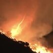 Now California is hit by FIRE TORNADO as wind whips up flames while LA blaze continues to spread