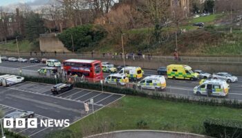 Police hunt killer of boy stabbed on London bus