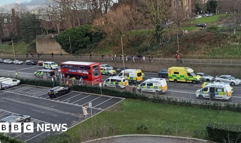 Police hunt killer of boy stabbed on London bus