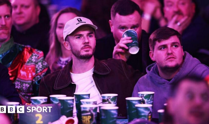 James Maddison watching darts