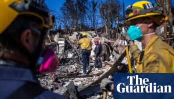 Power utility sued over woman’s death as crews make progress against LA fires