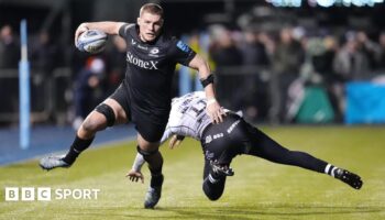 Tom Willis runs past a tackler to score a try