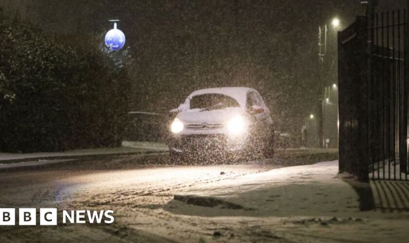 Snow and freezing rain sweep UK with amber warnings in place