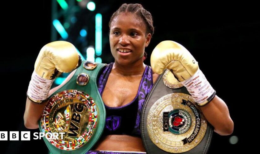 Caroline Dubois posing with the WBC and IBO belts