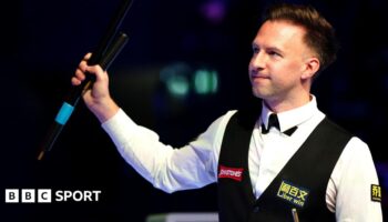 Judd Trump celebrates his quarter-final win at the Masters