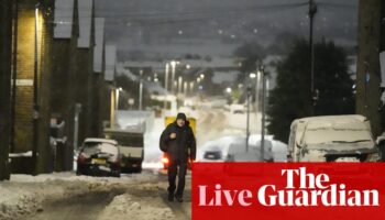 UK weather news: snow closes Manchester airport runways amid ice, flooding and train cancellations across country – live