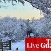 UK weather warnings remain in place as UK hit by snow and freezing rain – live updates