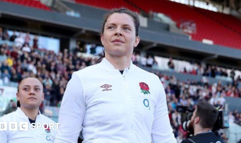 Abbie Ward wearing an England jacket