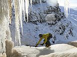 Waterfalls freeze as Arctic blast see mercury drop as low as -17C - as Britain experiences coldest January night for 15 years