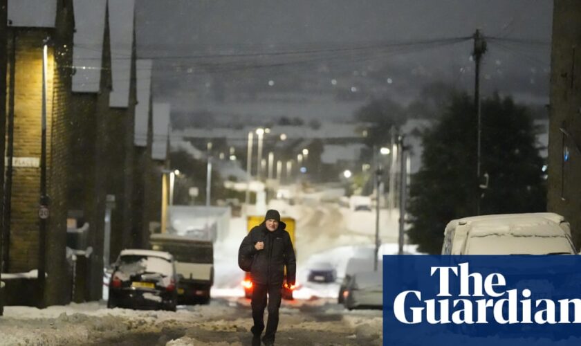 Weather warnings remain in place across UK as rain, ice and snow cause travel havoc