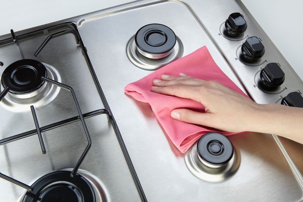 Woman's 'life-changing' cling film hack that removes stains from stove tops