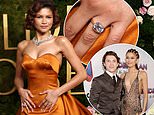 Zendaya 'got engaged to Tom Holland over the holidays' in 'romantic' proposal at home as she flashes diamond ring